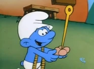 Tailor Smurf (cartoon) uses his hat as a pincushion.