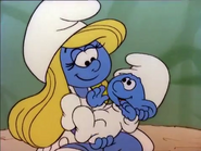 It's natural to give a Baby Smurf some tender care, that's what a mother would do to her child.