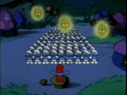 A group of Smurfs engaging in the Dance Of 100 Smurfs from the cartoon show