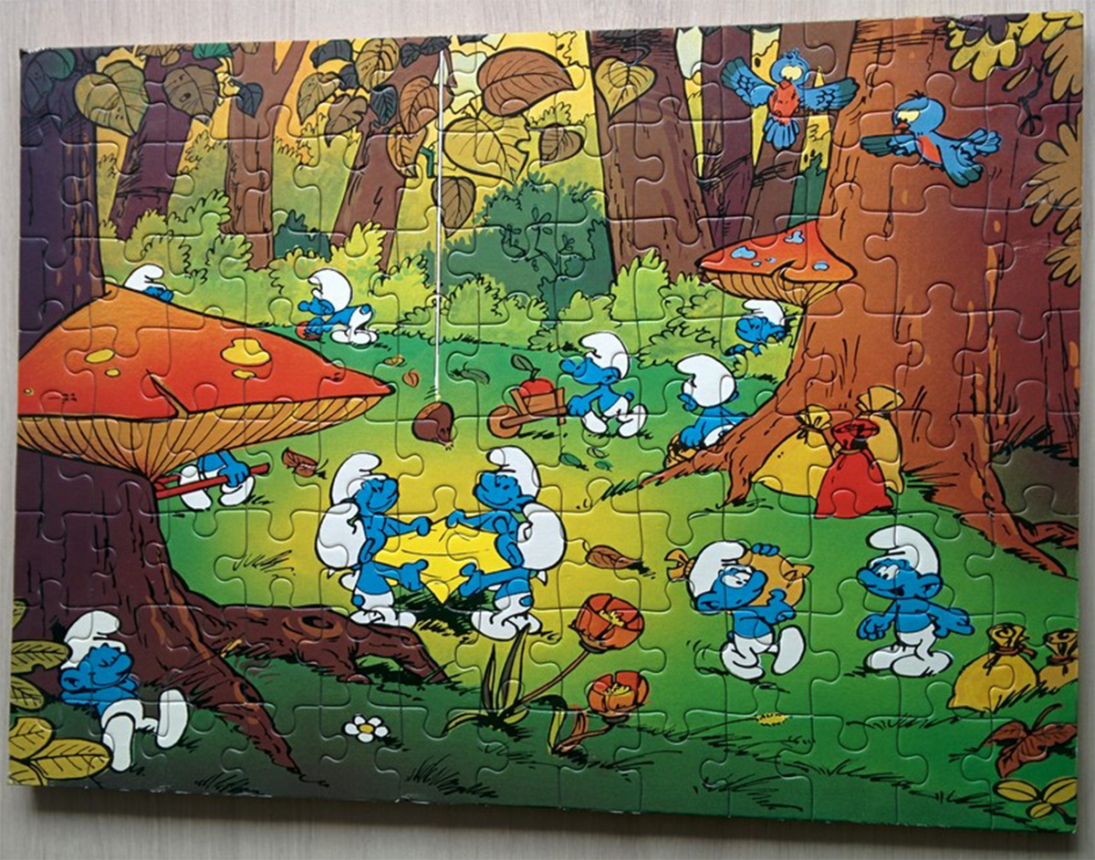 Trefl (14119) - Smurf Village - 24 pieces puzzle