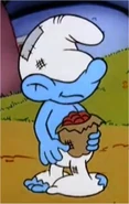 ...while Sloppy Smurf's hat is completely over his eyes and is grimy with a patch on it.