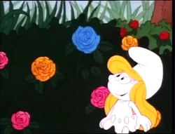 Her excitement over seeing a blue rose has left Smurfette rather pale.