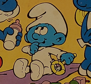 Baby on the cover of the Baby Smurf Game by Milton Bradley