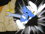 Handy tries to open the locket.