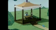 There's a gazebo right of the pillars and main pathway.