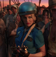 Officer Luciana wielding a harpoon gun.