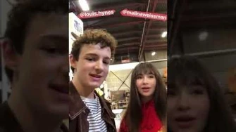 Louis_Hynes_and_Malina_Weissman_behind_set_tour