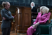 Olaf, Justice Strauss and Esmé during the trial.