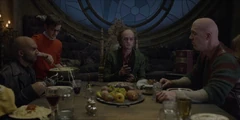 Count Olaf dinner.jpg (103 KB) Fernald and the troupe eating dinner with Olaf.