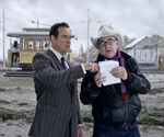 Patrick Warburton reviews the script with Barry Sonnenfeld, who's wearing his trademark cowboy hat.