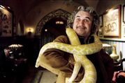 Monty holding a snake.