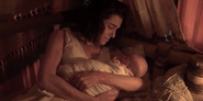 Kit and her newborn daughter.