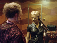 Jacquelyn threatening Count Olaf with a harpoon gun.