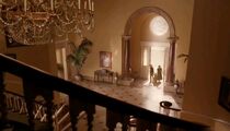 The Baudelaires enter their pleasant mansion.