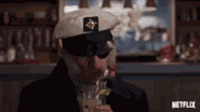 Captain Sham with a milkshake in the Anxious Clown resteraunt