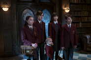 The Baudelaires and Quagmires in the library.