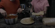 Violet making pasta.