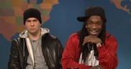 Taran Killam as Eminem (left) on the February 12, 2011 episode during the Weekend Update segment.