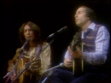 Paul Simon and George Harrison performing "Homeward Bound" on SNL.