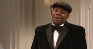 Kenan Thompson impersonating as LL Cool J.