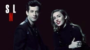 Season 44 of Saturday Night Live Bumper Photo from December 15, 2018, the ninth episode and the Christmas show of Season 44 of Saturday Night Live, hosted by actor Matt Damon: Miley Cyrus' 8th appearance, as well as her 4th musical guest stint with Mark Ronson, as he making his second musical guest stint on SNL. Their second performance was "Happy Xmas (War Is Over)".