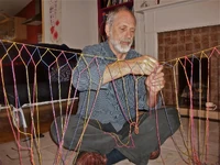 Philip tying a bubble net