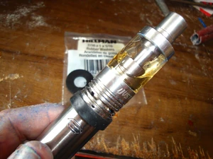 Move the first washer into position as shown