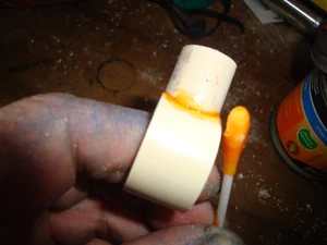 Using a Q-tip dab some cement to the outside of the contact point all the way around the seam