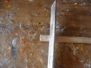 A 15" long 1/2" diameter wooden dowel piece is inserted into the CPVC cross piece tubing for added support. I coated the dowel piece with white carpenter's glue to prevent any possible rattling in case the fit was not perfect