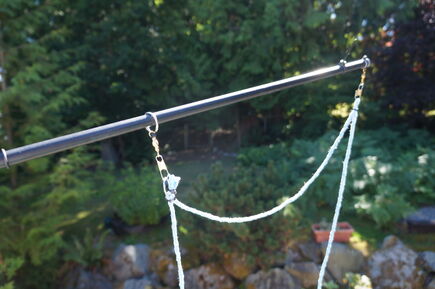 Ric Merry writes: "I call this a "snare wand". Not sure if there is another term. It's a single pole and the lower ring slides freely. It works well on windy days." EDITOR'S NOTE: This seems to be a DIY version of David Stein's wonderful Bubble Thing -- the invention that started the giant bubble sport.