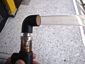 A tube can also fit inside the elbow fitting