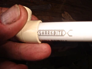 A CPVC elbow fitting ccan be used for the top piece. It may need to be shimmed so it will fit snugly over the mouthpiece of the atomizer. You can use a 1/2" PEX tubing or CPVC or another material or means for a sleeve.to make it fit