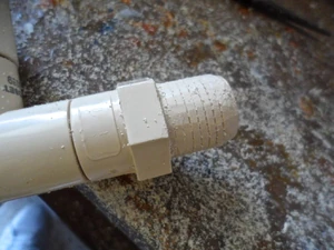 File the threads just enough so the 3/4" CPVC threaded piece will snugly fit over it
