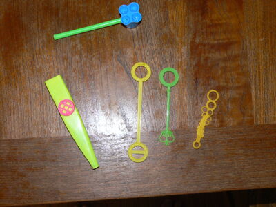 Some common cheap bubble toys that are often included in the purchase of a bottle of commercial bubble juice.