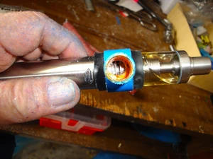 Line up this piece to align with the airlfow vents on on any atomizer you are using as shown...