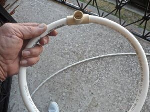 Manualy flex the hoop into more of a round shape
