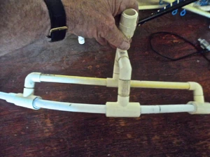 A closer look at how the bridge style brace is assembled using 1/2" CPVC fittings and 1/2" PEX tubing material for the hoop