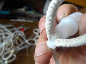 A very small touch of all purpose cement to the crotch of the zip-tie will keep the loop from closing up on you by accident. ALERT! DO NOT use superglue on the zipties. When the superglue cures the ziptie will become brittle and break at the point where it was applied.