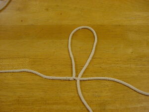 Continuing to work the excess back through