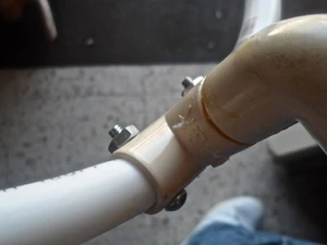 I put the end with the excess length facing inward so it wil not snag on the dipping tray.