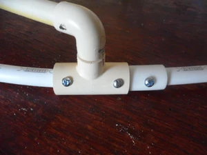 I used the appropriate size fine threaded machine nuts and bolts to firmly attached the pieces together that could not be glued
