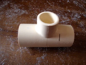 
3·/4" CPVC "T" fitting. Cut one end close to the center port as shown