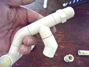 Close up detail of how to assemble the handle attachment piece
