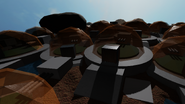 A bunch of domes on Mars with Phobos in the back resting on top of some domes