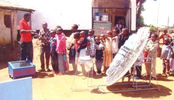 Children in line to taste food. Photos credit: Camily Wedende