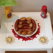 Les saucisses accompagnées de pommes de terre