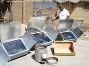Gnibouwa Diassana with cookers and painting