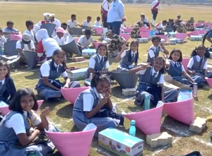 1000 children gathered at SuryaKumbh 2023 in Boisar, India, learning to assemble and prepare a meal with a solar cooker