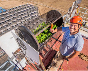 Ken Armijo preparing to solar-roast his chiles using heliostats, 8-8-22