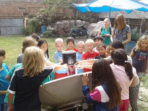 Exploring the parabolic solar cooker - Photo credit: FoST